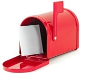 A red mailbox with an envelope inside