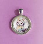 pendant with cat in a hooded shirt